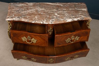 All-sided curved chest of drawers in amaranth...