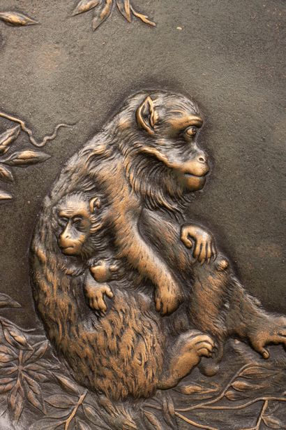 Bronze plate decorated with a monkey and...