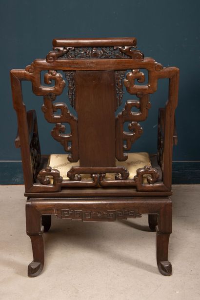 Carved exotic wood salon with three armchairs...