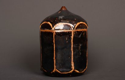 Brown-black enameled stoneware box with cut...