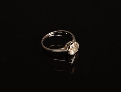 White gold solitaire set with an old-cut...