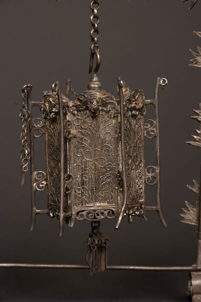 Portico supporting a miniature silver and...