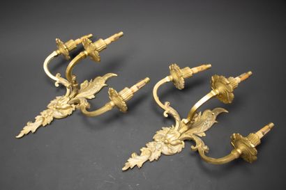 Pair of three-light bronze sconces.
Louis...