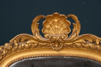 Mirror frame in wood and gilded stucco.
Late...