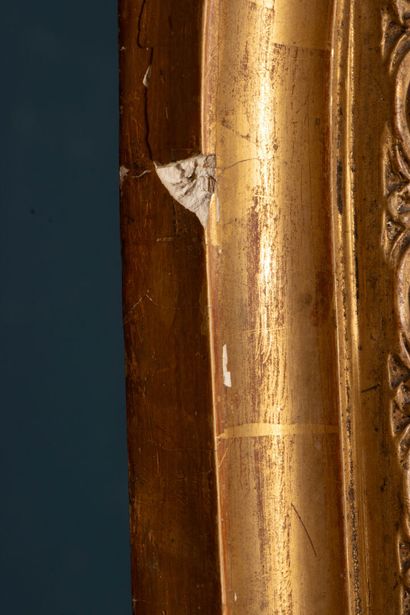 Mirror frame in wood and gilded stucco.
Late...