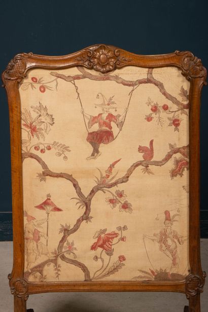 Carved wood fire screen.
Louis XV period
99...