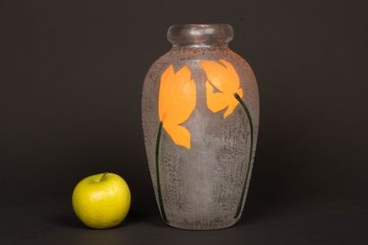 DAUM.
Baluster vase with hemmed neck in thick,...