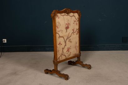 Carved wood fire screen.
Louis XV period
99...