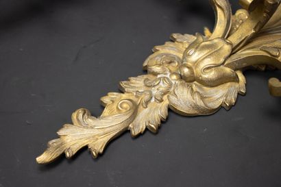 Pair of three-light bronze sconces.
Louis...