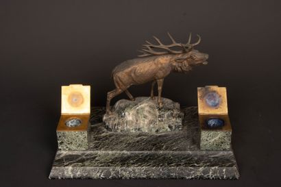 Marble desk inkwell surmounted by a patinated...
