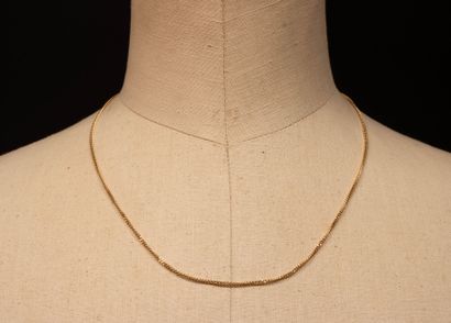 Gold curb chain.
750°/00 gold. 
Length: 50...