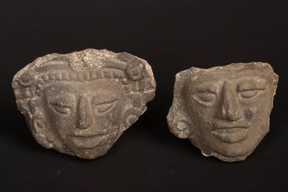 Reunion of two carved stone fragments depicting...