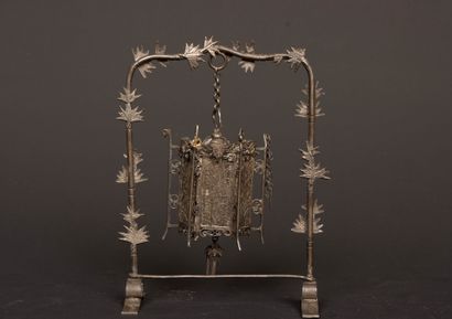 Portico supporting a miniature silver and...