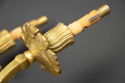 Pair of three-light bronze sconces.
Louis...
