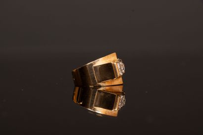 Gold tank ring set with five diamonds, the...