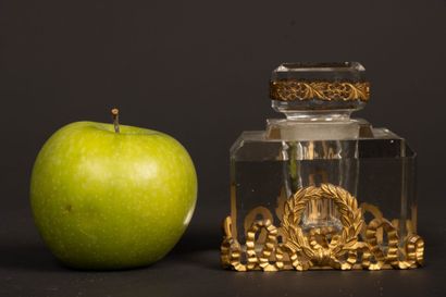 Glass inkwell and neo-classical bronze frame....
