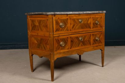 Chest of drawers in walnut with butterfly...