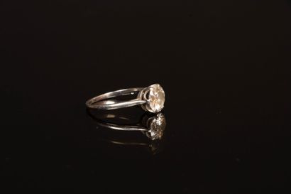 White gold solitaire set with an old-cut...