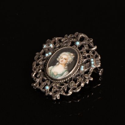 Enameled silver brooch adorned with a miniature...