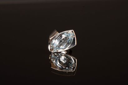 Modern white gold ring set with a marquise-cut...