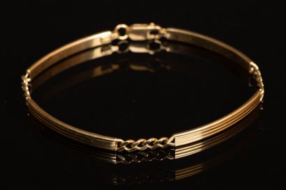 Gold bar link bracelet.
750°/00 gold. 
Length:...