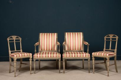 Pair of carved wood armchairs, two-tone rechampi.
A...