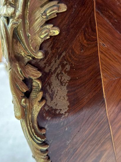 All-sided curved chest of drawers in amaranth...