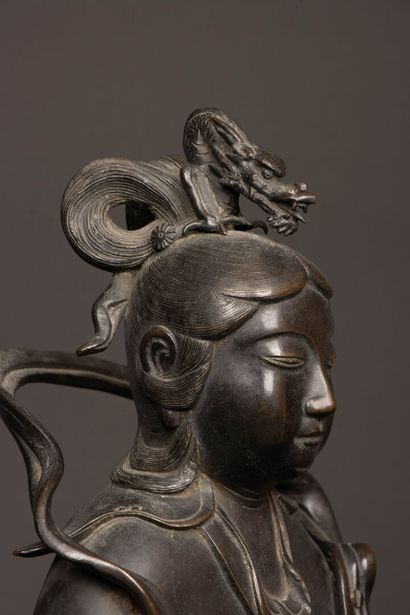 Large black patina bronze figure of Guanyin...