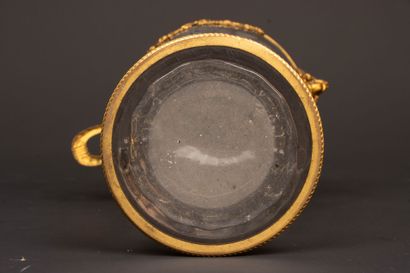 Engraved glass vase with brass frame decorated...