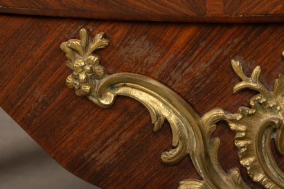 All-sided curved chest of drawers in amaranth...