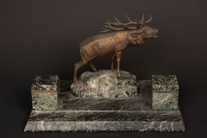 Marble desk inkwell surmounted by a patinated...