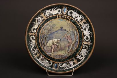 Stoneware dish with enameled decoration of...