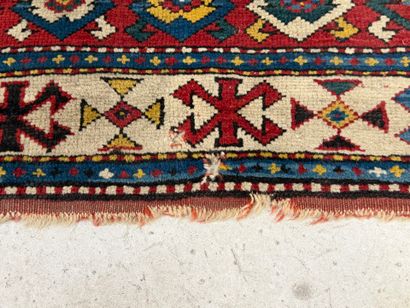 Oriental hand-woven wool rug
Hole at edge...