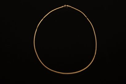 Gold curb chain.
750°/00 gold. 
Length: 50...