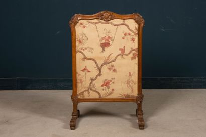 Carved wood fire screen.
Louis XV period
99...