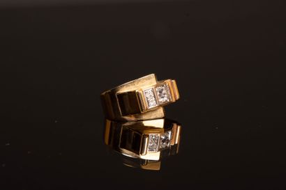 Gold tank ring set with five diamonds, the...