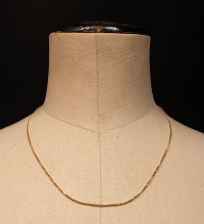 Gold curb chain.
750°/00 gold. 
Length: 50...
