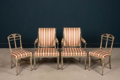 Pair of carved wood armchairs, two-tone rechampi.
A...