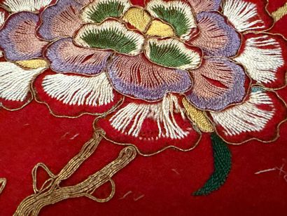 Pair of embroidered red silk curtains.
China...