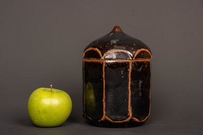Brown-black enameled stoneware box with cut...