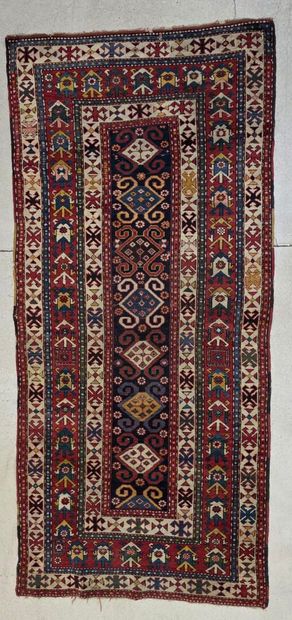 Oriental hand-woven wool rug
Hole at edge...