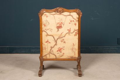 Carved wood fire screen.
Louis XV period
99...