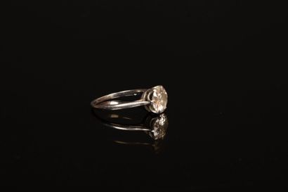 White gold solitaire set with an old-cut...