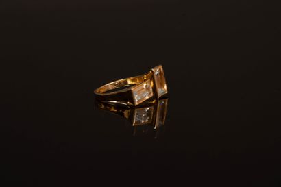 Asymmetrical yellow gold ring set with two...