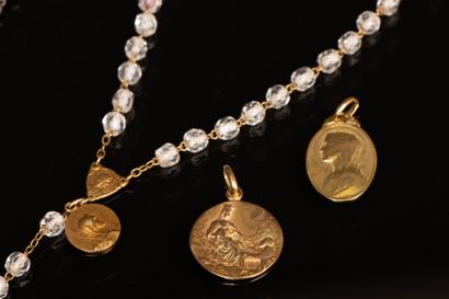 Two religious medals in gold 750°/°° -
Weight:...