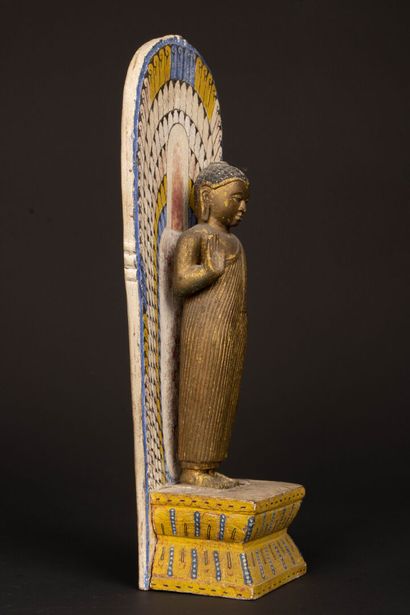INDIA.
Polychrome wooden statuette of a standing...