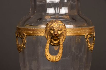 Engraved glass vase with brass frame decorated...