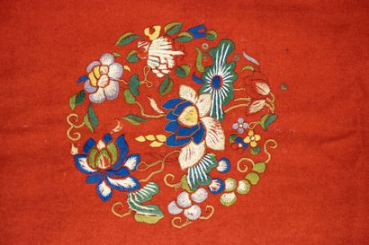 Pair of embroidered red silk curtains.
China...