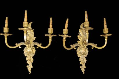 Pair of three-light bronze sconces.
Louis...