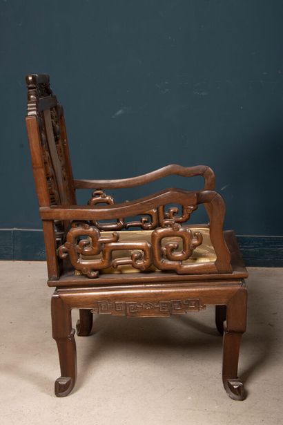 Carved exotic wood salon with three armchairs...